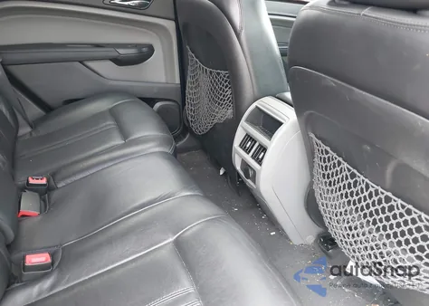 2010 Cadillac Srx Turbo Performance z USA, uszkodzony, nr VIN 3GYFNJE48AS625909